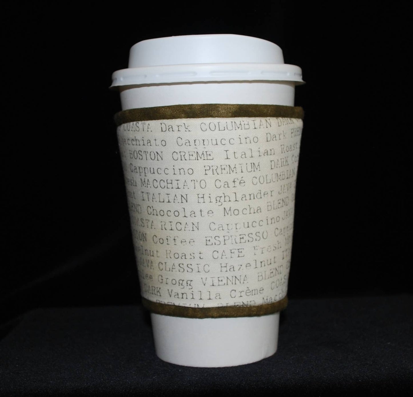 Cup Cozee - Typewritten Coffee Words On Cream